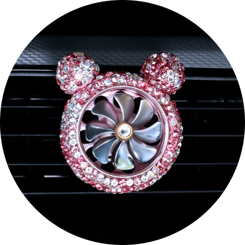Glamorous pink crystal car air freshener with internal fan and jewel accents