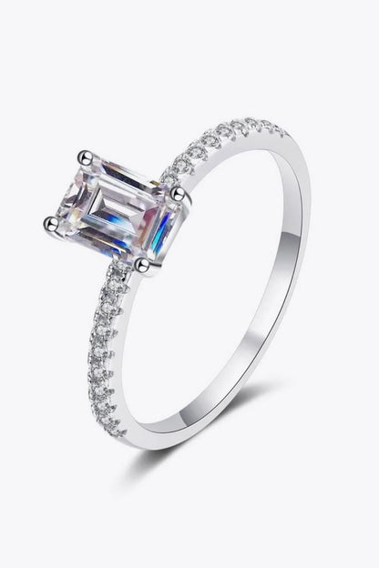 Exquisite 925 sterling silver ring with a radiant moissanite centre stone, accented with sparkling zircon stones for added elegance.