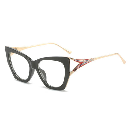 Refined cat eye sunglasses with blue gradient lenses and sleek metal frames, offering timeless British style and UV400 protection.