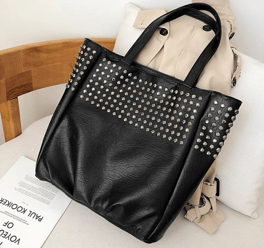 Premium British leather tote bag in black, featuring a large capacity design and stylish, versatile appeal.