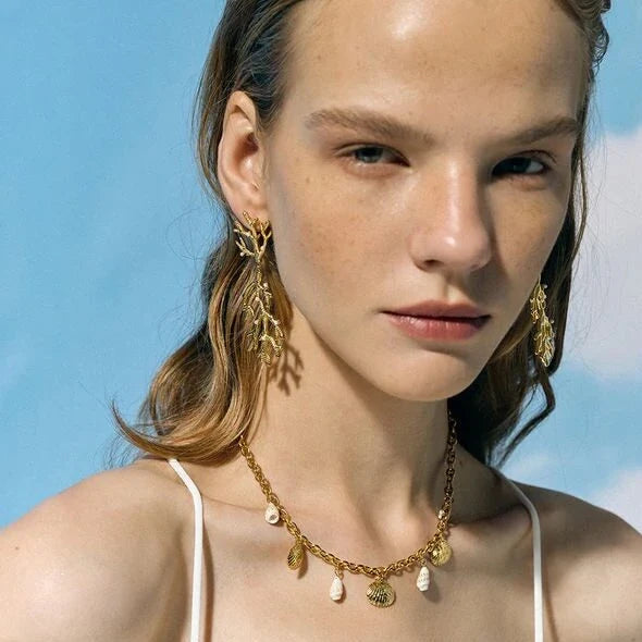 Elegant 18K gold plated coral pearl pendant earrings with a secure stud closure and a tarnish-proof finish