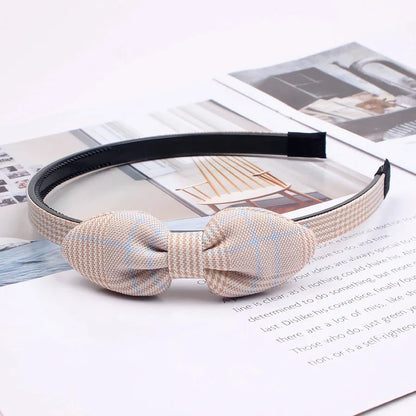 Charming bow headband for girls, a stylish hair accessory made from high-quality canvas and rubber for a comfortable, secure fit