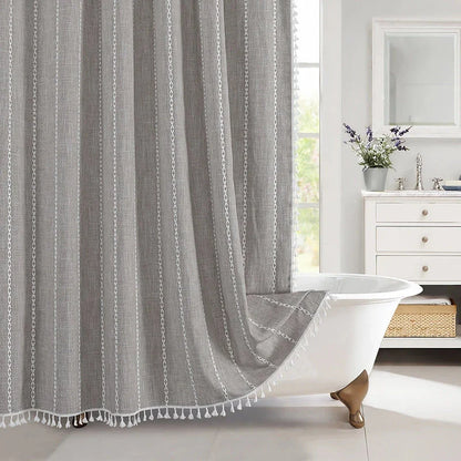 Premium bohemian tassel shower curtain with unique stitching design, waterproof coating, and durable linen blend material for a relaxing bathroom oasis