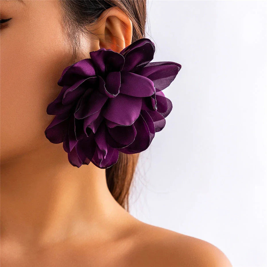 Exquisite fluffy fabric flower stud earrings in a black metal colour, featuring oversized fabric blooms for a unique and elegant design.