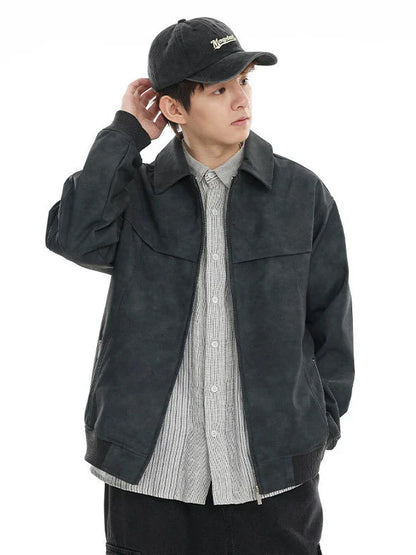 A classic distressed leather jacket in a relaxed, unstructured fit suitable for both men and women