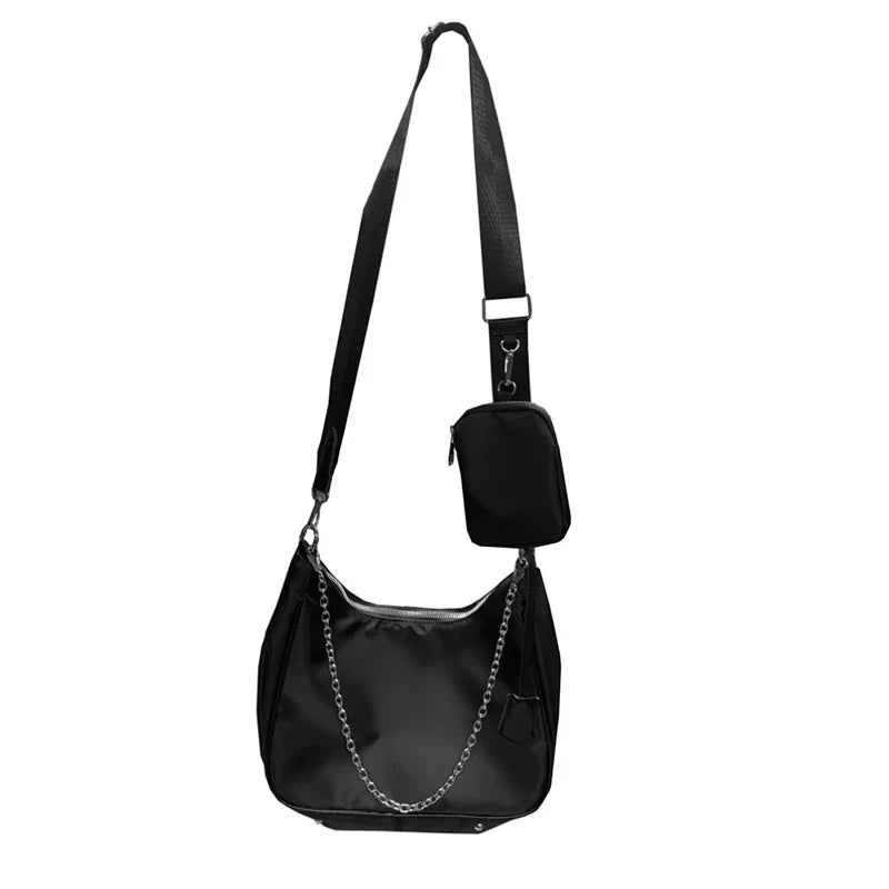 Stylish black crossbody bag with a British-inspired design, featuring a spacious interior and comfortable single-strap for hands-free convenience.