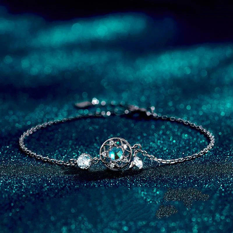 Enchanting sterling silver bracelet with genuine moonstone and celestial motifs