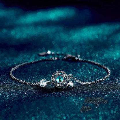 Enchanting sterling silver bracelet with genuine moonstone and celestial motifs