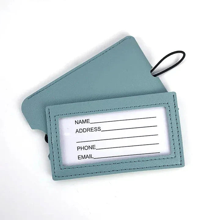 Premium PU leather luggage tags in a vibrant gray colour, with a discreet pull-out information card for easy customization.