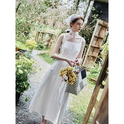 Elegant French White Suspender Long Dress with a relaxed A-line silhouette and premium cotton fabric