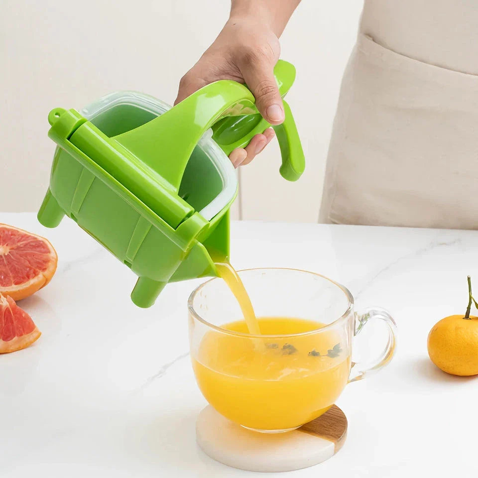 Premium manual fruit and citrus juicer with compact, portable design and multiple colour options