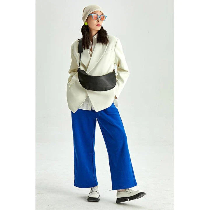 Stylish leather crossbody fanny pack with vintage half-moon design, perfect for everyday use in the UK