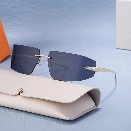 Elegant rimless rectangular sunglasses with a sleek, minimalist design and contemporary silhouette