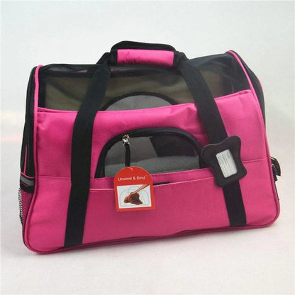 Portable pet carrier bag made of durable nylon with breathable mesh panels for your dog or cat's comfort during travel