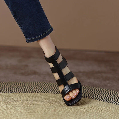 Luxurious leather gladiator sandals with square heel and buckle strap, providing style and comfort for any occasion.