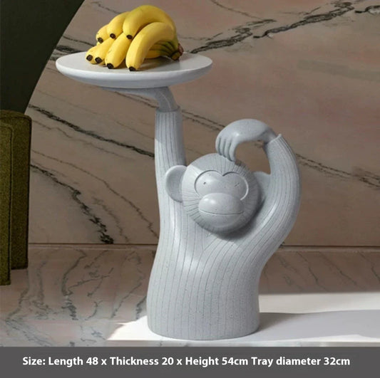 Decorative monkey-inspired resin coffee table tray in light grey or dark grey colour, suitable for serving, display, or as a living room accent piece.