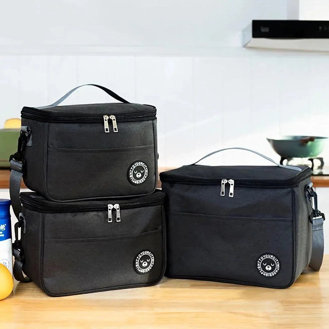 Premium thermal lunch bag in various colours, featuring insulation, waterproof design, and adjustable shoulder strap for busy UK professionals