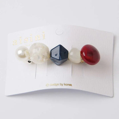 Elegant pearl hair clip with a sophisticated design, made of premium alloy materials for long-lasting durability and a secure fit.