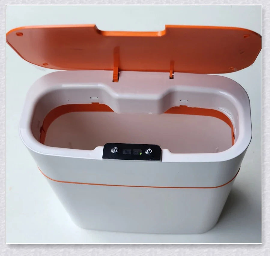 Sensor-powered bin with sleek design and touch-free motion-activated lid for effortless, hygienic waste disposal