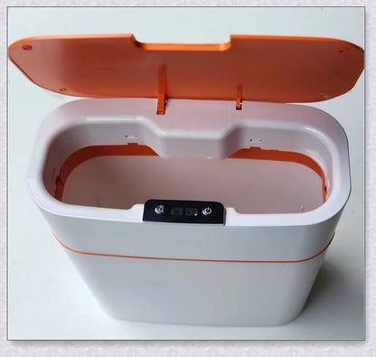 Sensor-powered bin with sleek design and touch-free motion-activated lid for effortless, hygienic waste disposal
