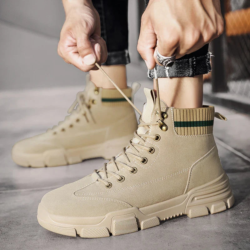 Premium high-top leather work boots in black, featuring a durable rubber sole and front-tie design for a secure and comfortable fit.