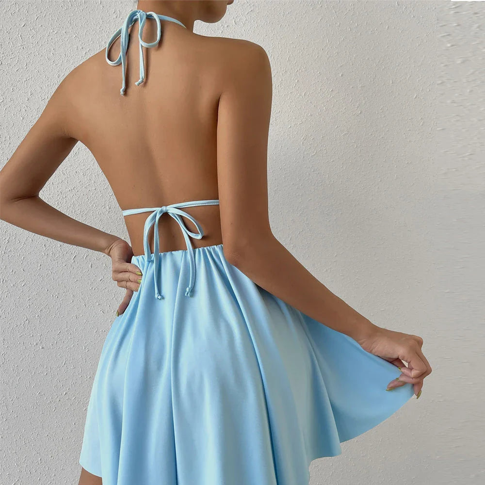 Sleeveless blue halter mini dress with a flattering A-line silhouette and chic summer style