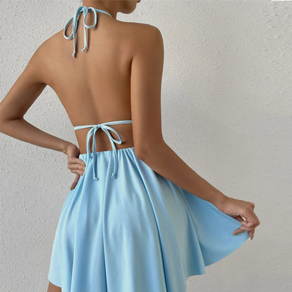 Sleeveless blue halter mini dress with a flattering A-line silhouette and chic summer style