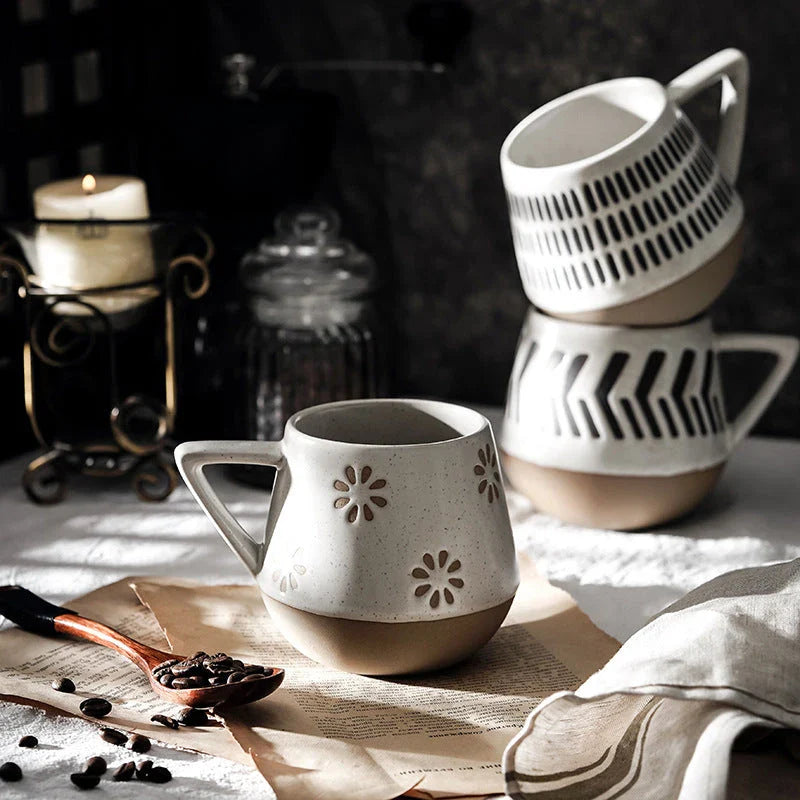A hand-painted ceramic mug featuring a unique Nordic-inspired design, perfect for enjoying coffee, tea, or other beverages