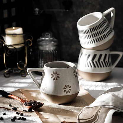 A hand-painted ceramic mug featuring a unique Nordic-inspired design, perfect for enjoying coffee, tea, or other beverages