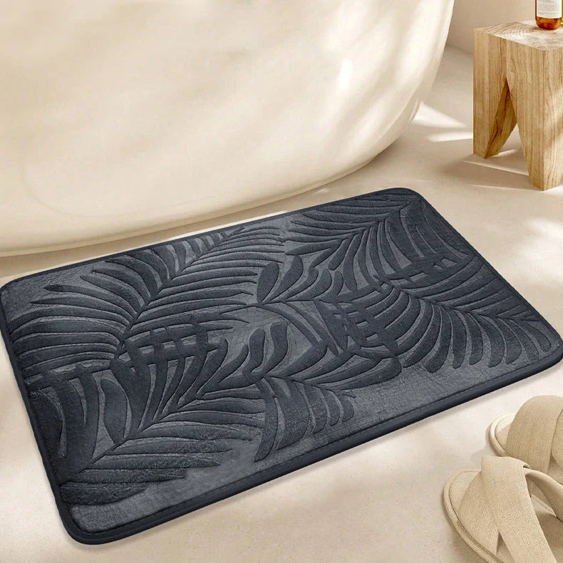 Stylish leaf pattern memory foam bath mat with a 3D embossed design, providing comfort and safety for any room in the home.