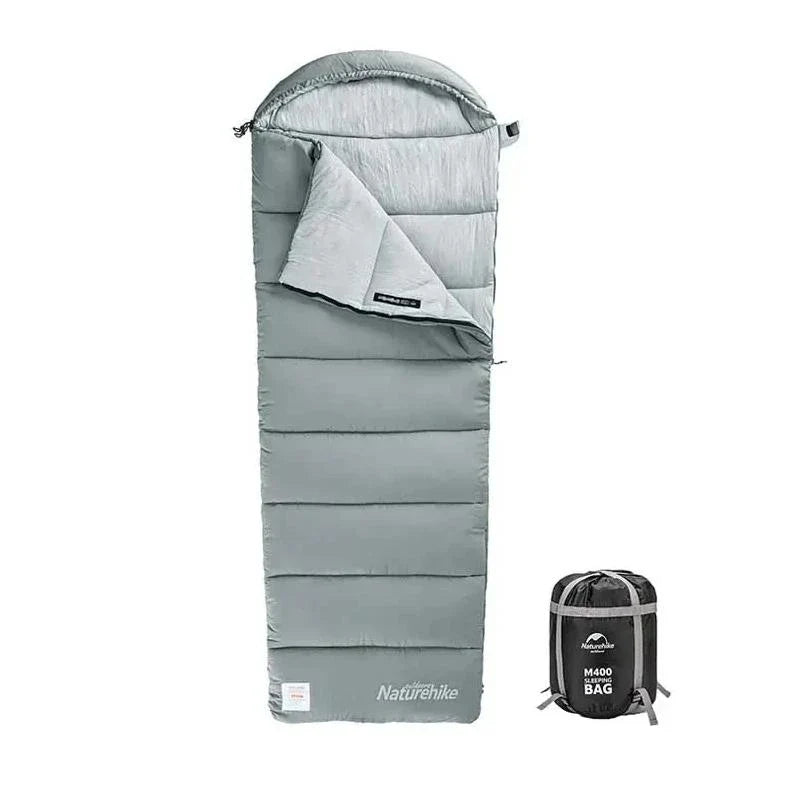 Premium lightweight double camping sleeping bag with cotton filling and terylene fabric, suitable for spring and autumn camping trips in the UK.