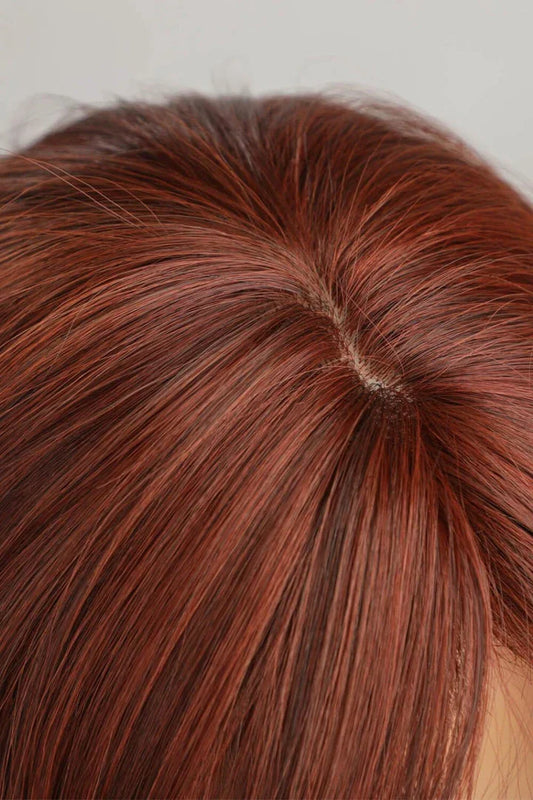 Luxurious mid-length wave synthetic wigs in 20-inch length, featuring a natural and sophisticated look for versatile styling