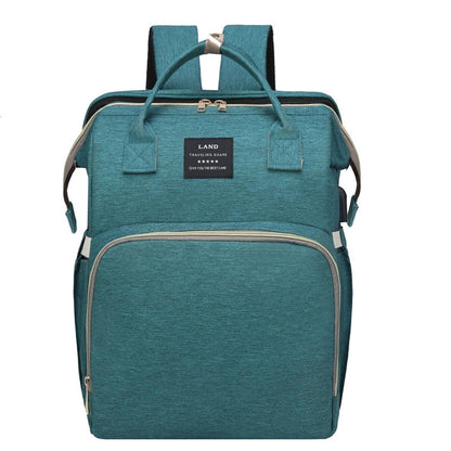 Multifunctional maternity diaper backpack with removable mosquito net, foldable crib, and water-resistant design for convenient family travel
