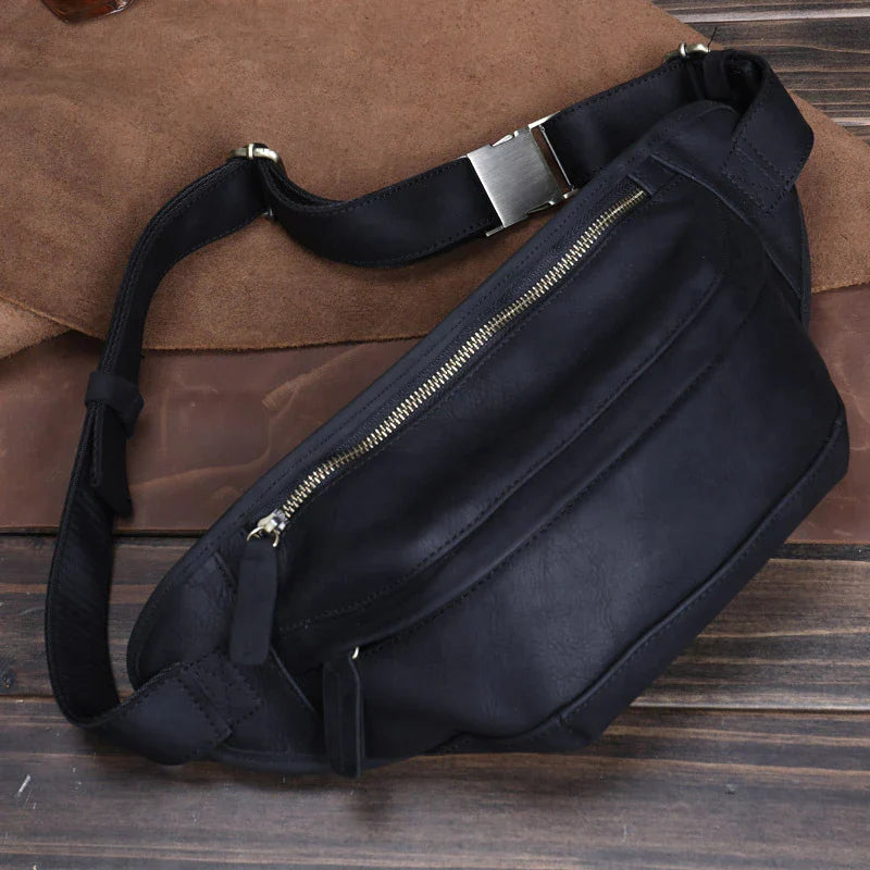 Premium British leather crossbody bag with adjustable strap and multiple pockets for organised storage
