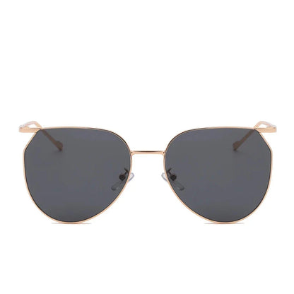 Elegant oval-shaped sunglasses with gradient lenses and alloy frames, offering timeless British style and UV protection.