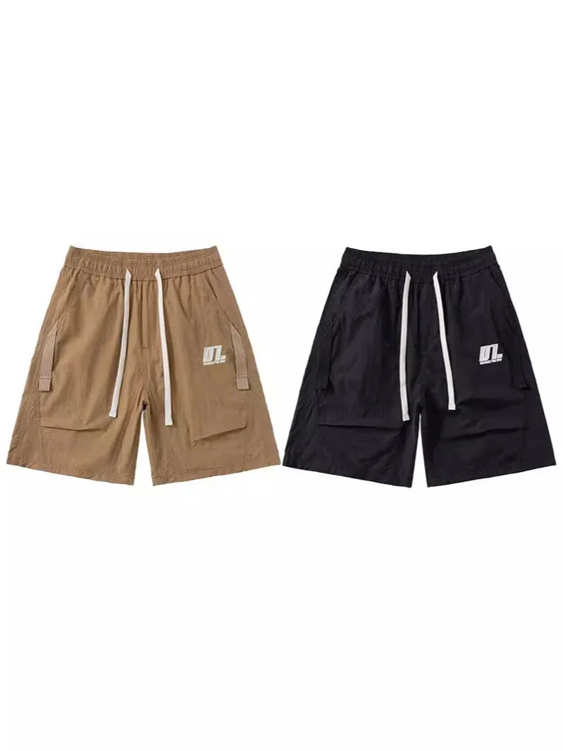 Premium Mountaineering Trousers in black and khaki colours, featuring a relaxed straight-leg fit and durable nylon construction for outdoor adventures.