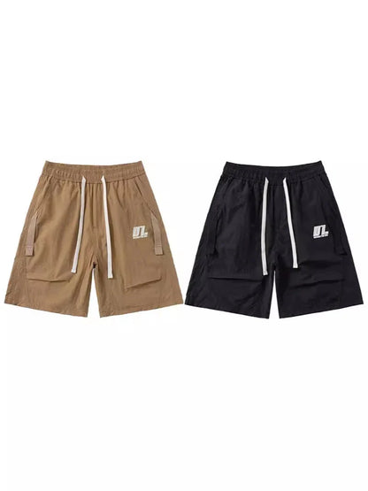 Premium Mountaineering Trousers in black and khaki colours, featuring a relaxed straight-leg fit and durable nylon construction for outdoor adventures.