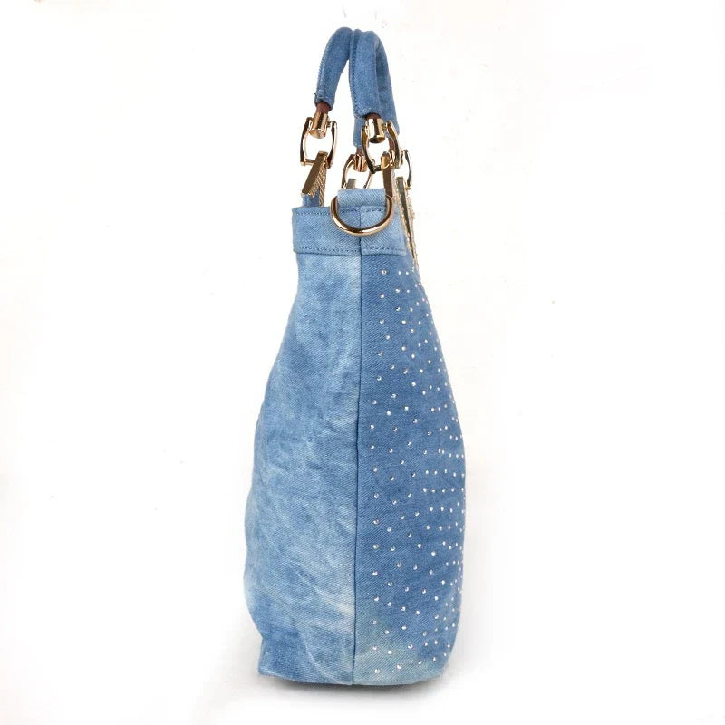 Light blue denim crossbody bag with sparkling diamond-inspired detailing from Trendha