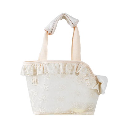 Stylish and comfortable pet carrier bag for small dogs in a floral lace design, providing breathable and cushioned support for your furry friend