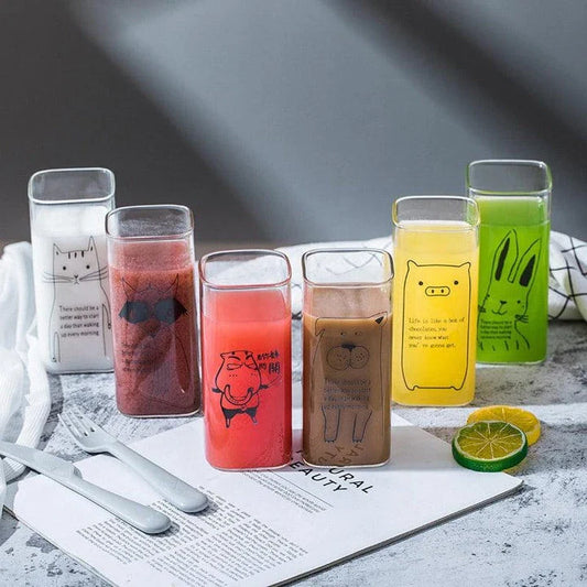 Charming animal-themed glassware with adorable pig, cat, and dog designs, made from durable, eco-friendly glass