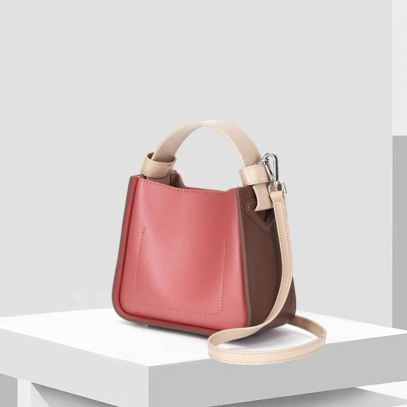 A stylish microfibre leather tote bag with a chic bucket shape and ruched detailing, perfect for the modern British woman.