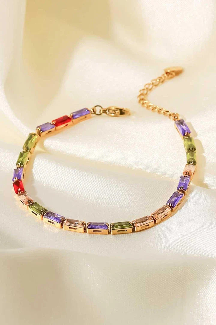 Elegant 18K gold plated bracelet with multicoloured cubic zirconia stones, a versatile accessory that adds a touch of sparkle to any outfit.