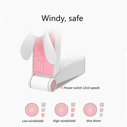 Compact, rechargeable handheld fan in pink and green colours with foldable and adjustable design for portable cooling