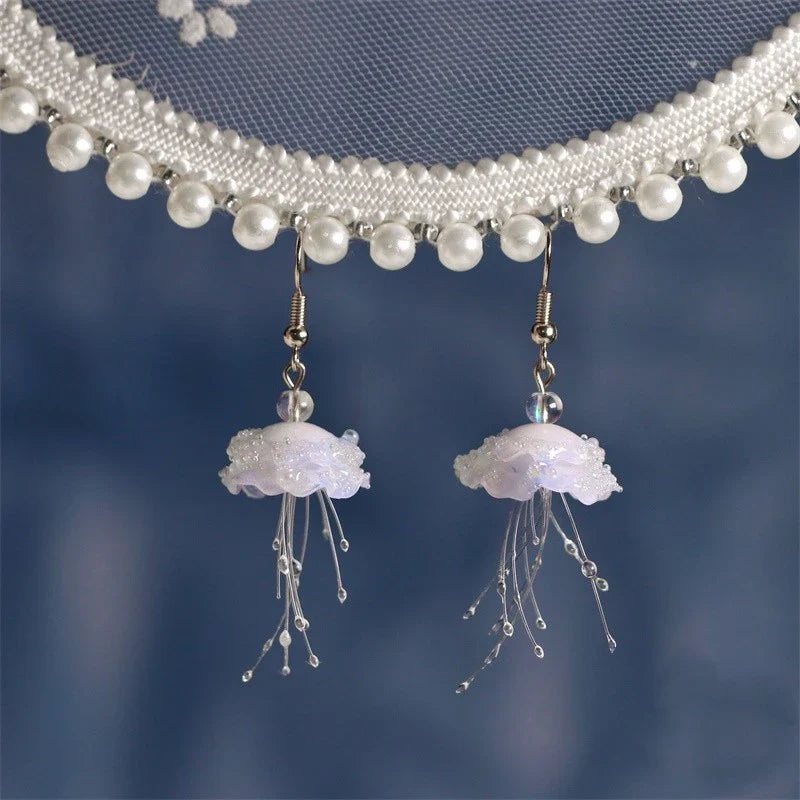 Elegant cloud-like jellyfish earrings with a captivating marine-inspired design, perfect for fashion-forward women in the UK