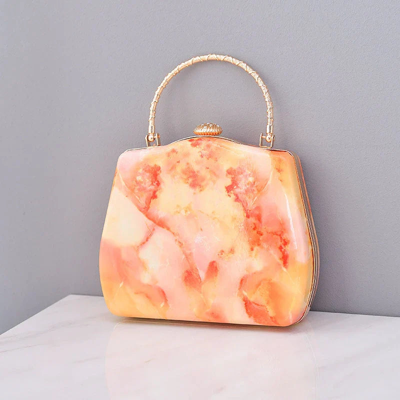 Premium marble-patterned crossbody bag for stylish ladies, featuring PU leather construction, roomy interior, and adjustable strap for hands-free carrying