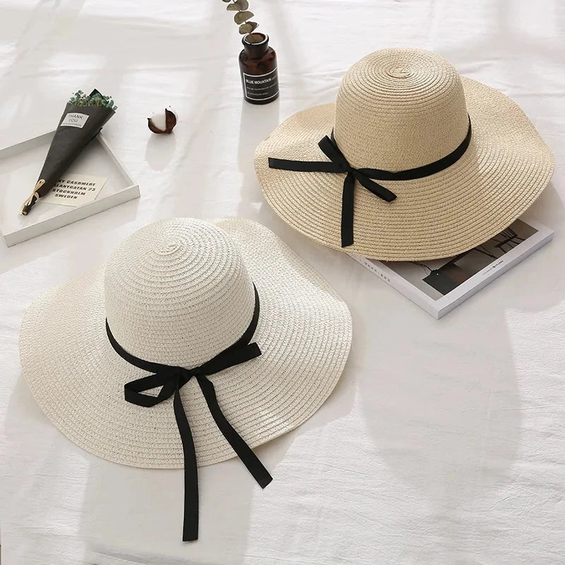 Fashionable straw hat for women with wide brim, foldable design, and stylish bow detail
