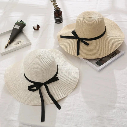 Fashionable straw hat for women with wide brim, foldable design, and stylish bow detail