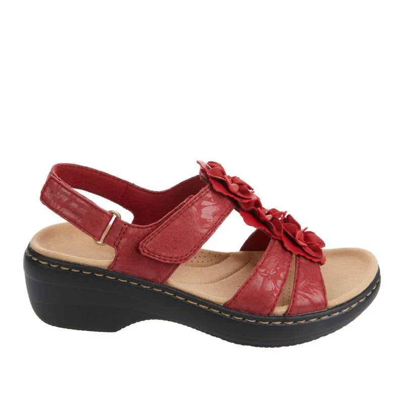 Stylish wedge sandals in a range of vibrant colours, featuring a chic fish mouth design and delicate flower accents for a modern, casual-chic look.