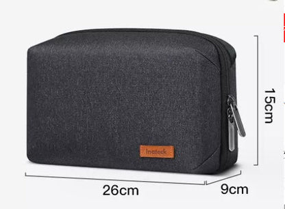 A stylish and waterproof travel organiser bag with cable storage compartment, perfect for keeping your tech essentials organised and protected on the go.