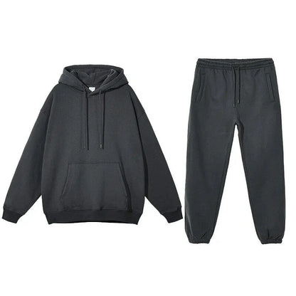 Cosy fleece hoodie and jogger set in light pink, grey, and navy blue colours for ultimate comfort and style